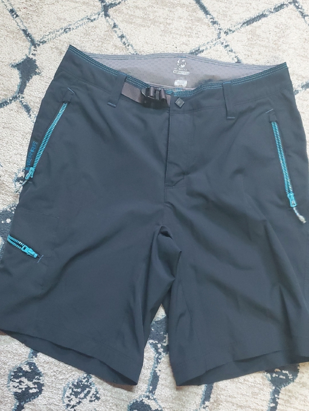 Merrell Select Wick Dark Blue Active Shorts with Teal Zipper Details